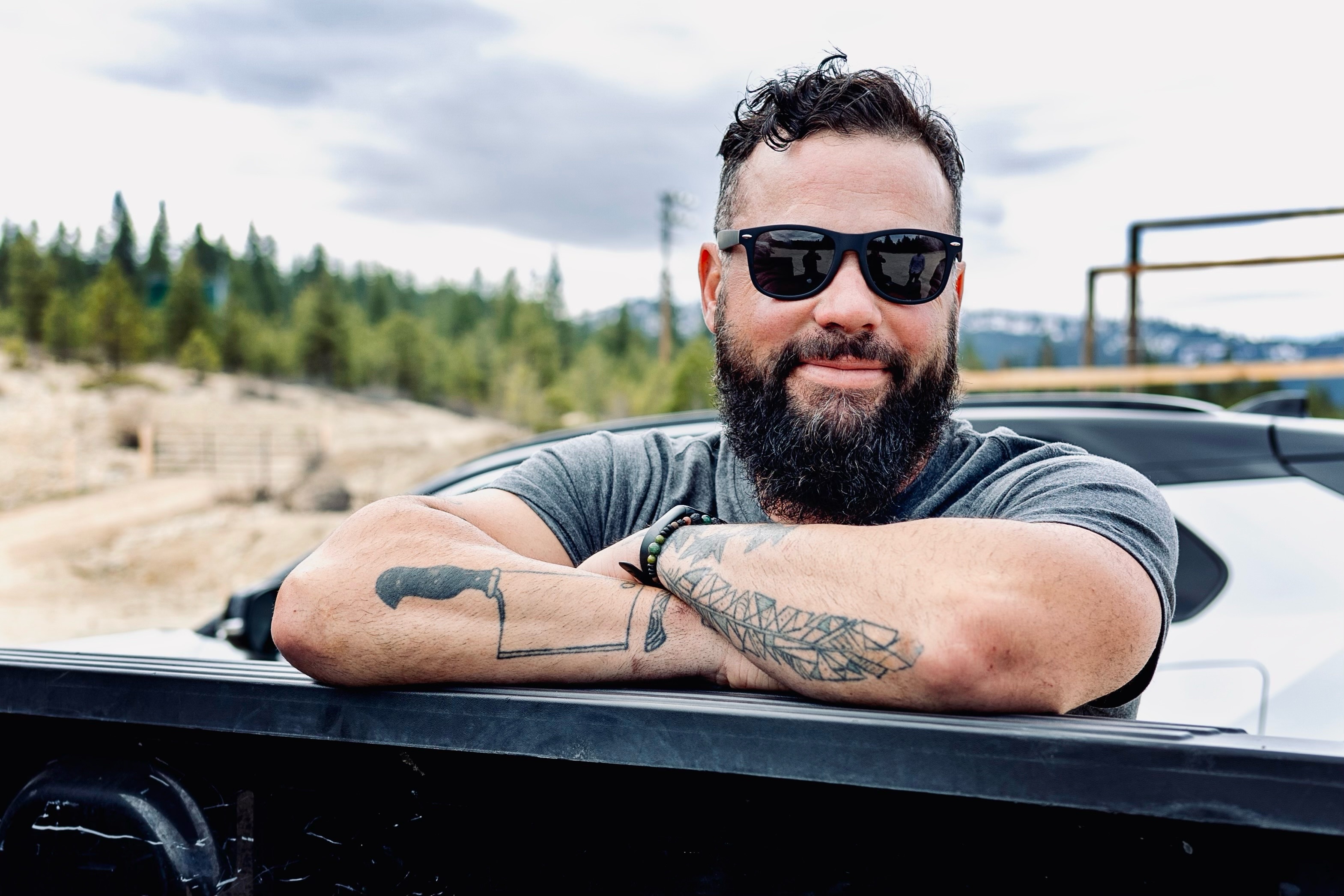 Owner and dog at sunset